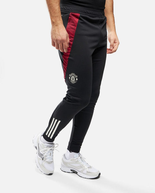 Pantalon d'entrainement Manchester United 2024/2025 - Noir/Rouge - FootKorner Testing