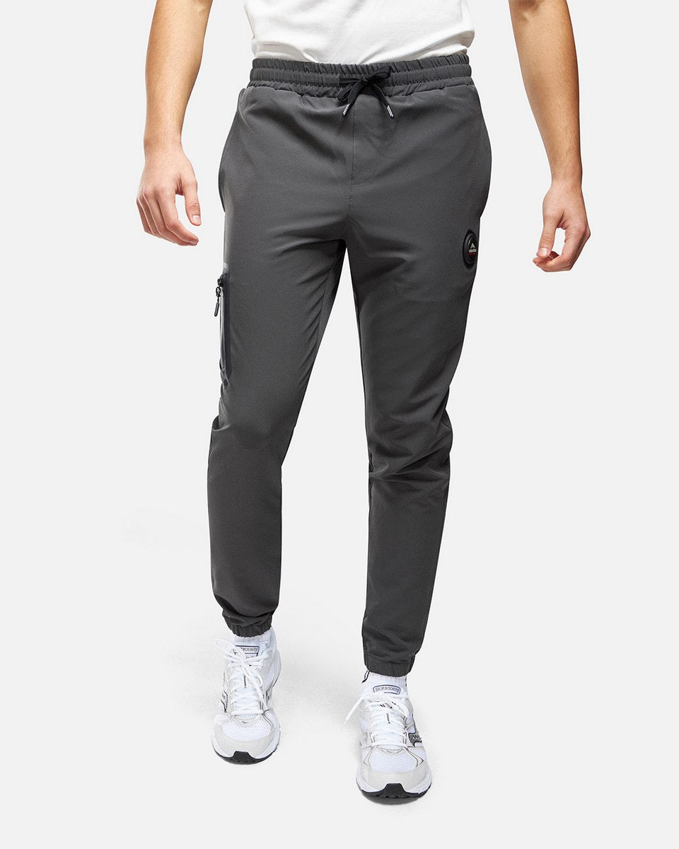 FootKorner TestingPantalon jogging Helvetica Terra - Gris