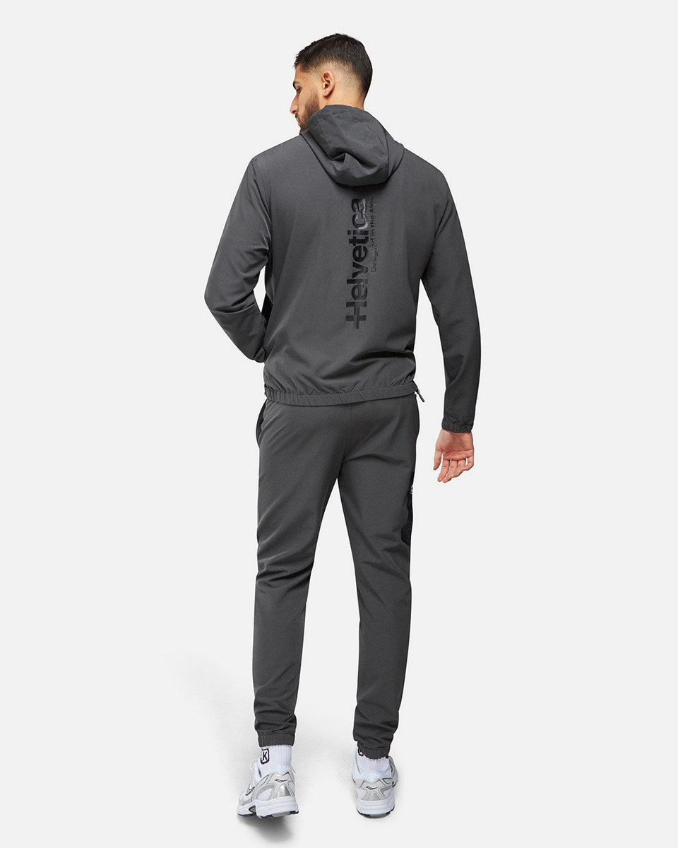 FootKorner TestingPantalon jogging Helvetica Terra - Gris