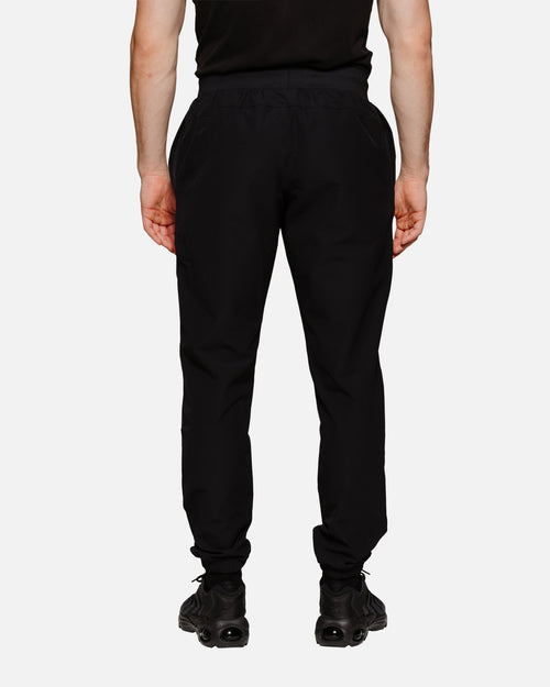 Pantalon de Jogging Under Armour Stretch Woven - Noir - FootKorner Testing