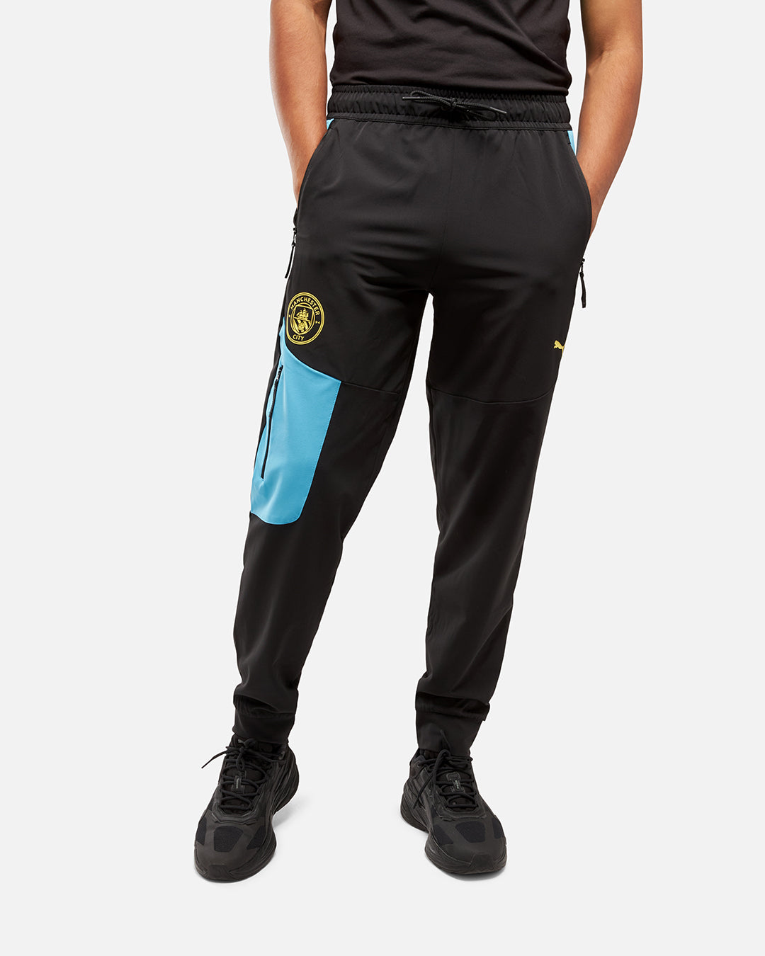 FootKorner TestingPantalon de survêtement Manchester City Pumatech - Noir/Bleu