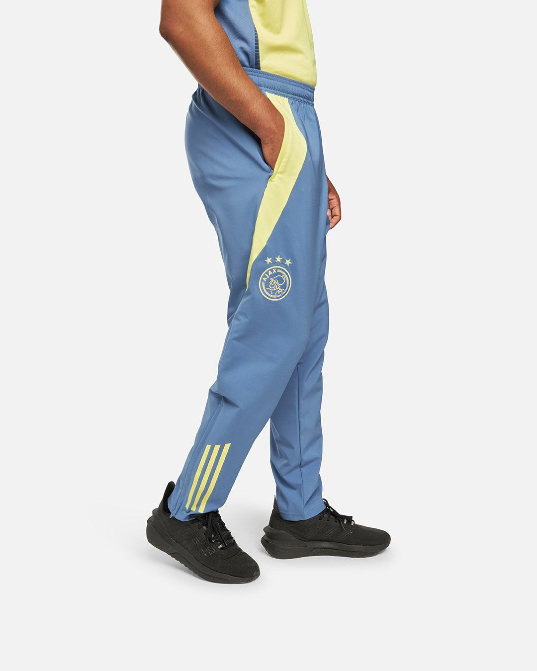 FootKorner TestingPantalon de survêtement Ajax Amsterdam 2024/2025 - Bleu/Jaune