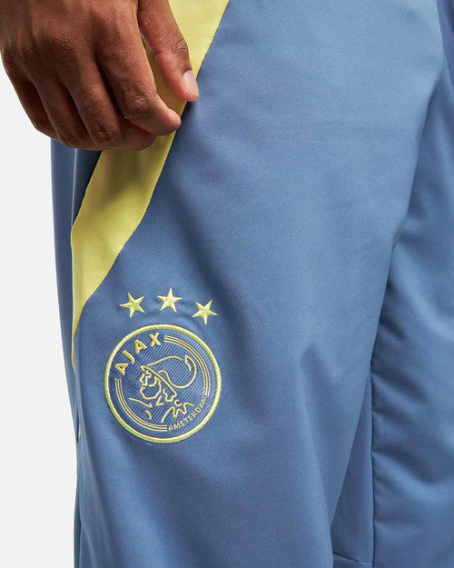 Pantalon de survêtement Ajax Amsterdam 2024/2025 - Bleu/Jaune - FootKorner Testing