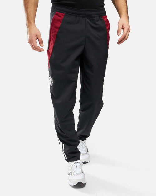 Pantalon de survêtement Manchester United 2024/2025 - Noir/Rouge - FootKorner Testing