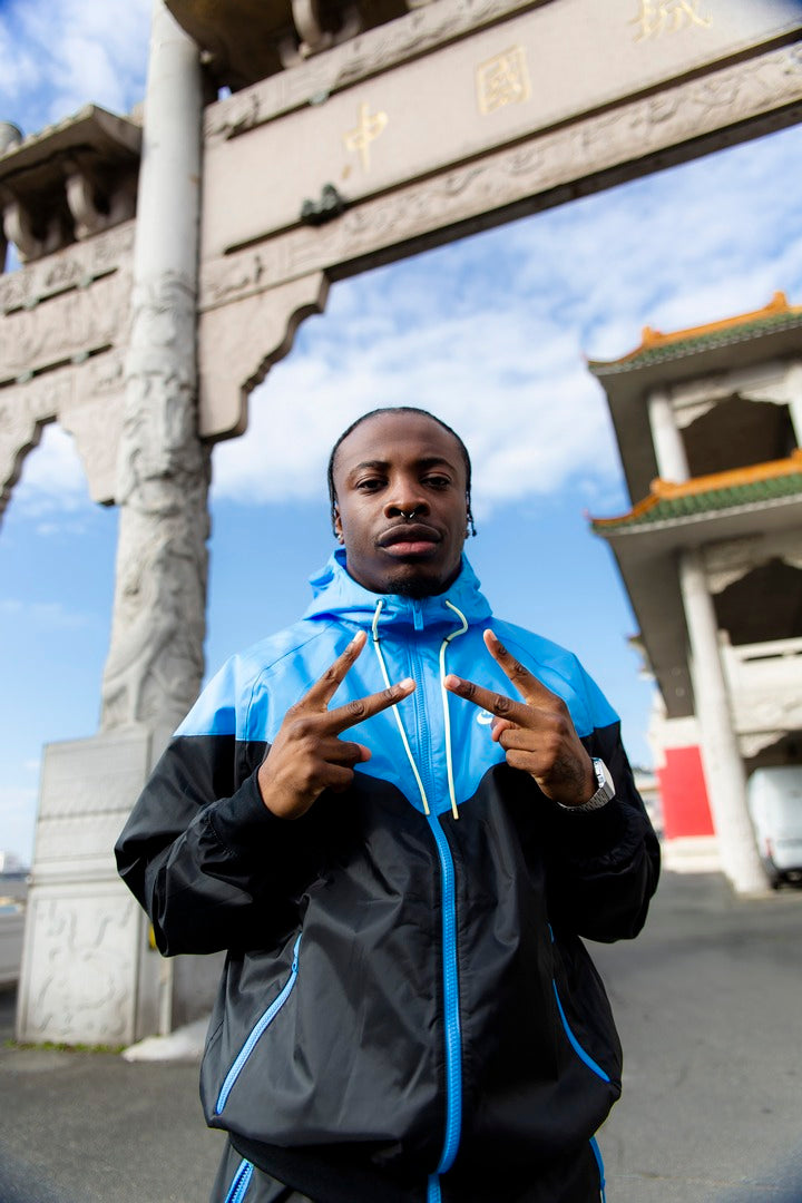 FootKorner TestingVeste Coupe - Vent Nike Sportswear Windrunner - Noir/Bleu