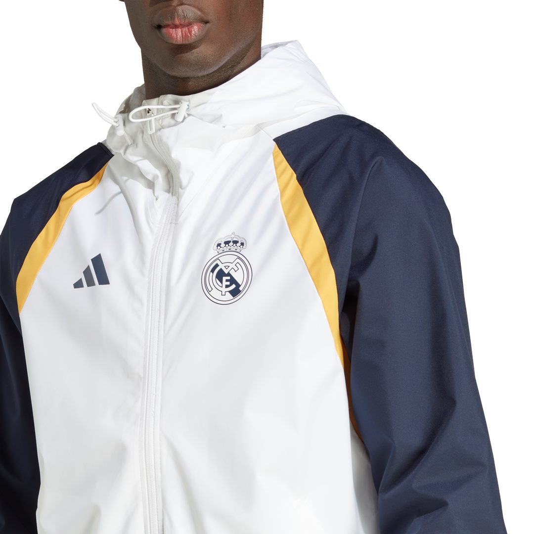 FootKorner TestingVeste Coupe-Vent Real Madrid 2023/2024 - Blanc/Bleu/Jaune