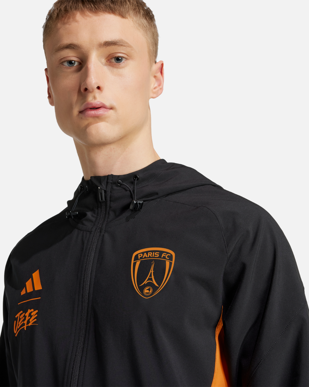 FootKorner TestingVeste de survêtement Paris FC x Jefe - Noir/Orange
