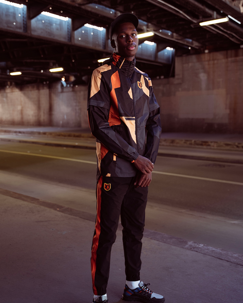 Veste Coupe-Vent FK AWK - Noir/Orange - FootKorner Testing