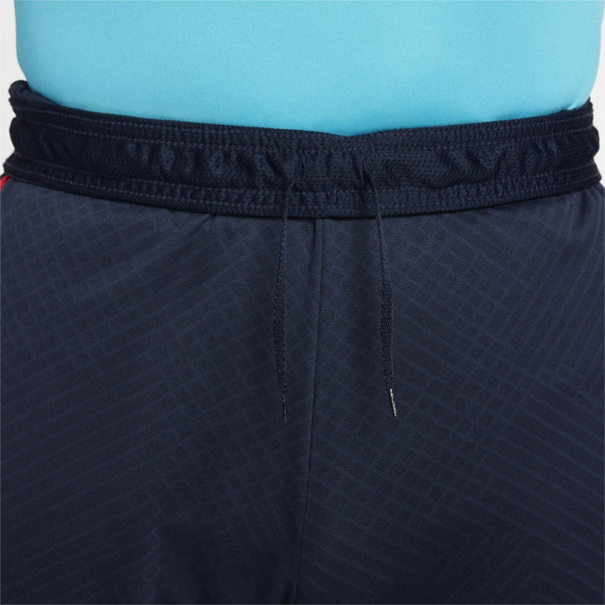 FootKorner TestingShort d'entrainement FC Barcelone Strike - Bleu/Orange